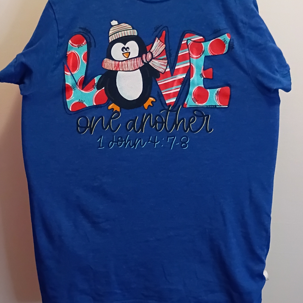 Charming Blue Tee with Penguin Design